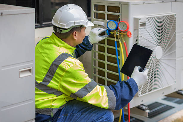 Professional Hvac technician working in Machesney Park, IL